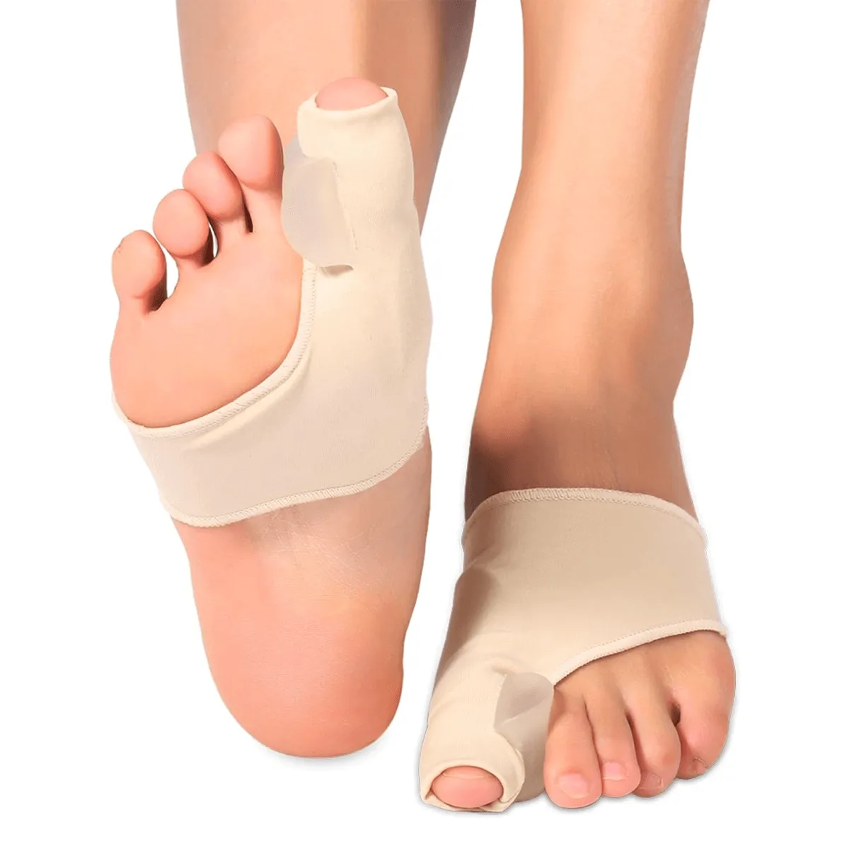 Beige hallux valgus-stöd på båda fötterna